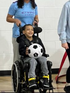 ltpf boy in wheelchair w soccer ball+rev