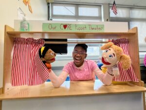 dolan puppet theatre smiling student
